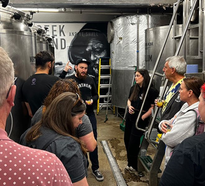 beer trippers getting a tour of brewery
