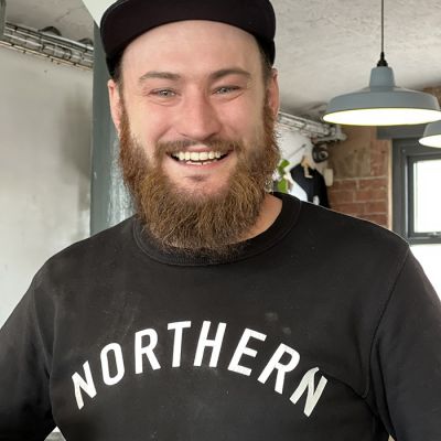 smiling team member at Northern Monk Brewery