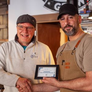 Captain Kurt presenting Grunting Growler award