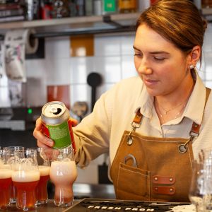 Bartender pouring craft beers