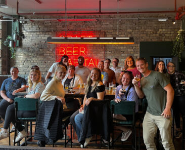 happy beer trippers enjoying pints at the doghouse in Edinburgh