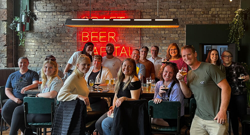 happy beer trippers enjoying pints at the doghouse in Edinburgh
