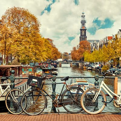 bicycles chained to bridge in Amsterdam