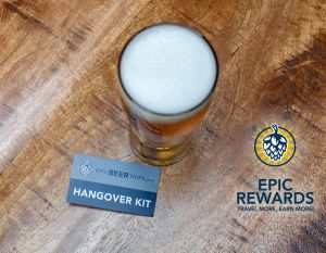 beer pint on wooden table with epic beer trips hangover kit and Epic Rewards logo